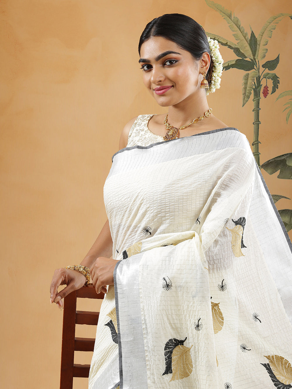 Off White Color Cotton Silver Striped Set Saree With Black And Cream Floral And Leaf Embroidery