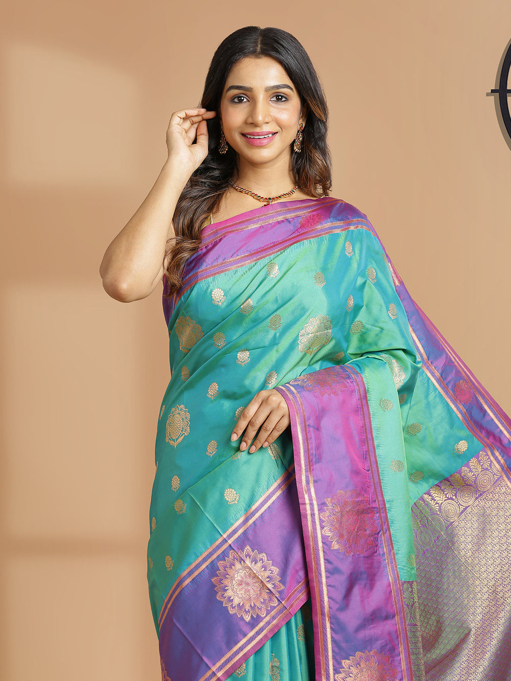Peacock Green Art Silk Saree With With Buttas And Purple Border