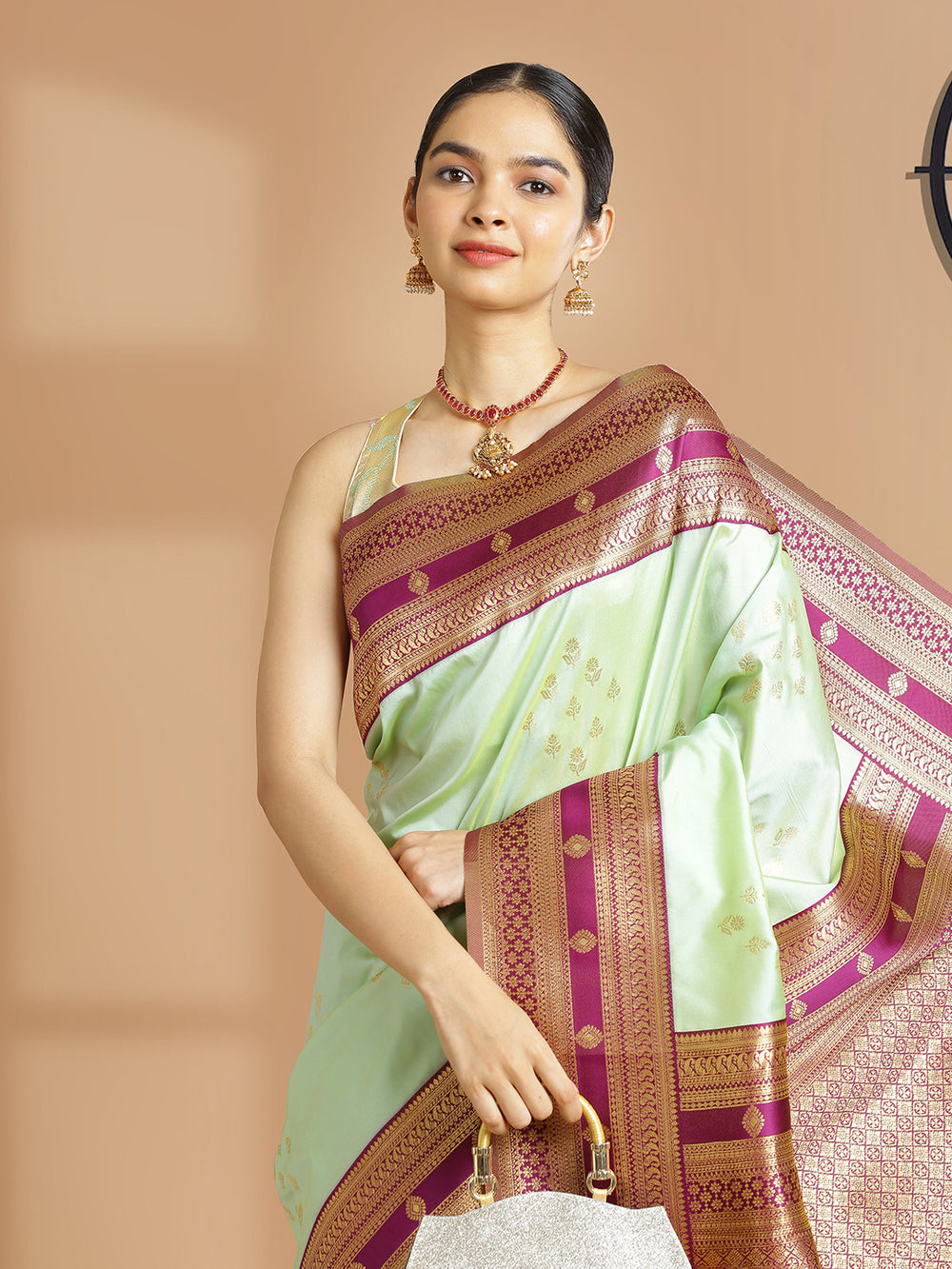 Pasta Green Color Art Silk Saree With Small Golden Buttas Over Body
