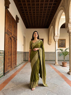 Kanjivaram Olive Green Plain Saree with Heavy Zari Embroidered Border and Rich Designer Pallu