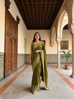 Kanjivaram Olive Green Plain Saree with Heavy Zari Embroidered Border and Rich Designer Pallu