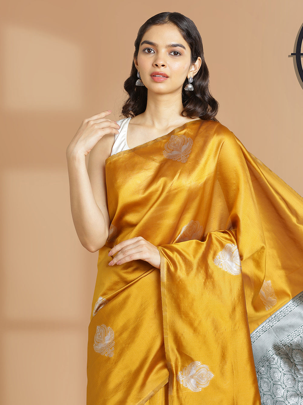 Golden Yellow Art Silk Saree With Silver Butta Design Over Body And Bottle Green Border