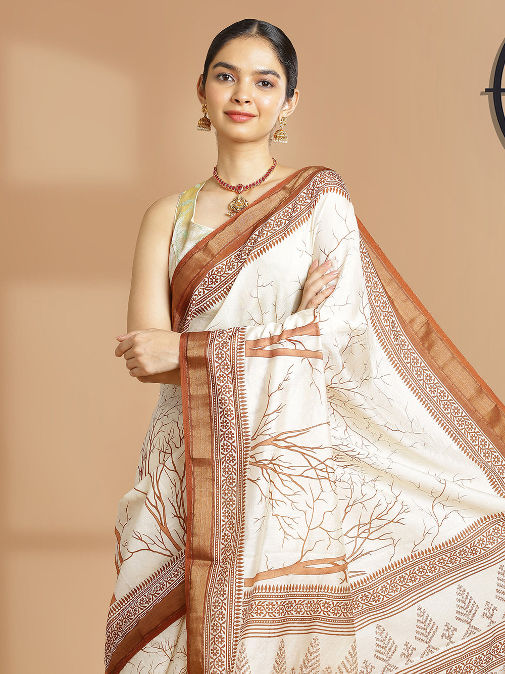 Off White Color Chanderi Silk Saree With Brown Border And Print Design Over Body
