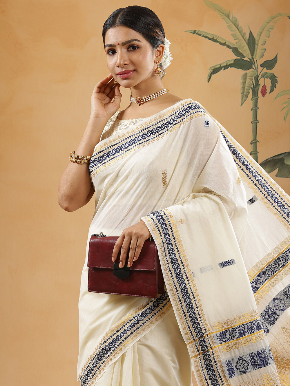 Off White Color Cotton Set Saree With Navy Blue With Golden Designed Border And Buttas