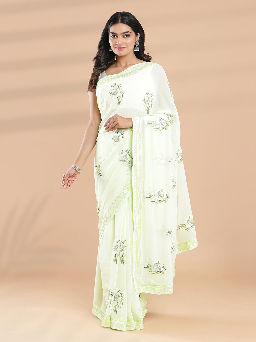 Light Green Color Georgette Saree With Spreaded Thread Worked Floral Design