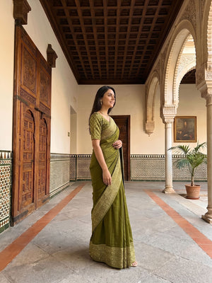 Kanjivaram Olive Green Plain Saree with Heavy Zari Embroidered Border and Rich Designer Pallu