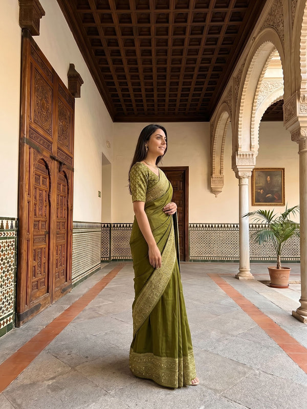Kanjivaram Olive Green Plain Saree with Heavy Zari Embroidered Border and Rich Designer Pallu
