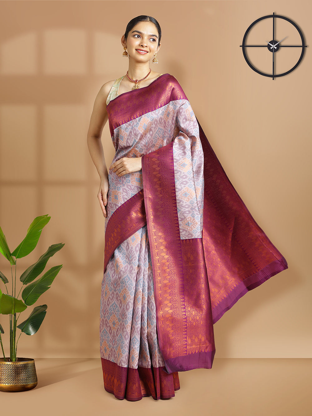 Light Lavender Art Silk Saree With Ikat Design Over Body And Purple Border