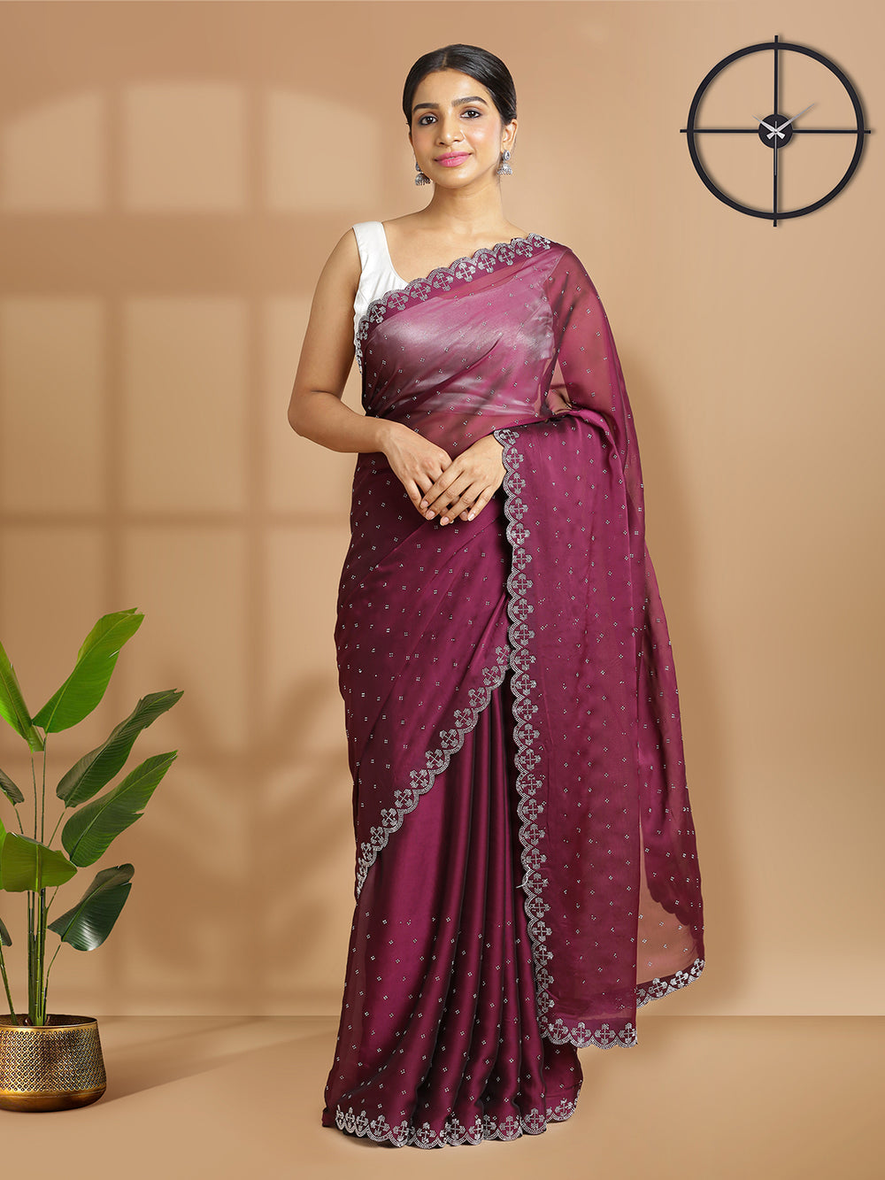 Wine Poly Chiffon Saree With Silver Sequent Design Over Body