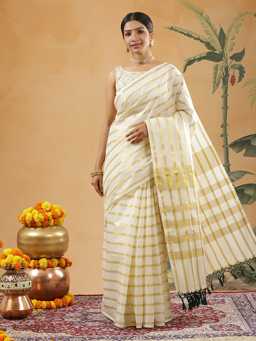 Off White Color Cotton Border Less Set Saree With Horizontal Golden Stripes With Green Tassels