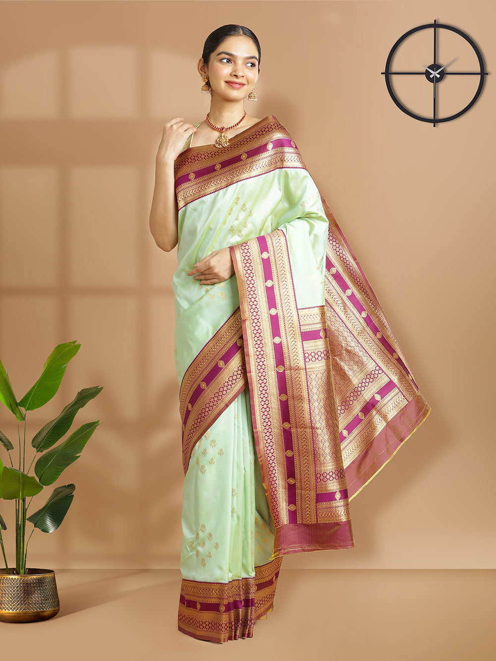 Pasta Green Color Art Silk Saree With Small Golden Buttas Over Body