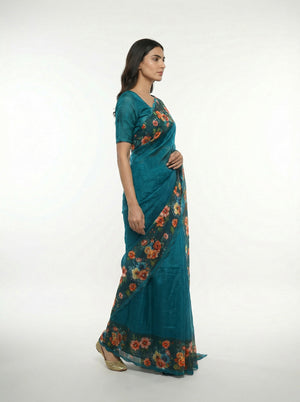 Cotton Teal Blue Saree with Elegant Floral Motifs and Printed Border