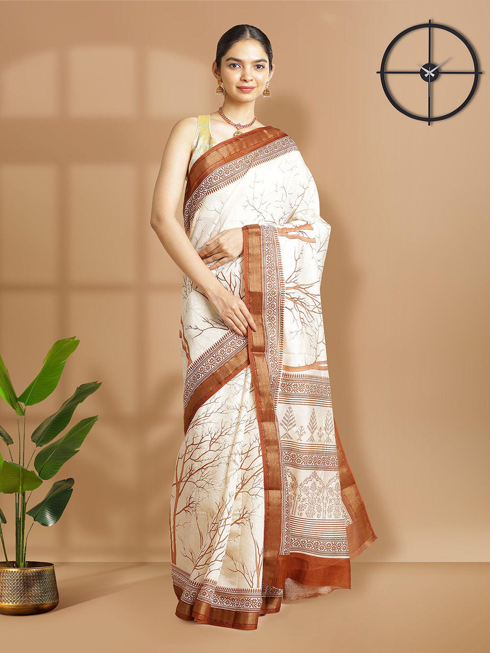 Off White Color Chanderi Silk Saree With Brown Border And Print Design Over Body