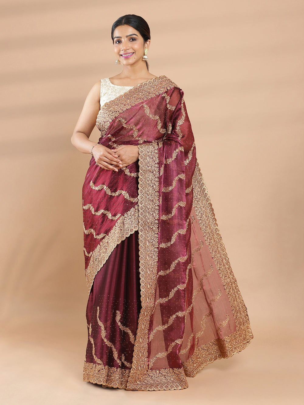 Maroon Color Glass Organza Saree With Mini Stones & Fully Golden Embroidery Design
