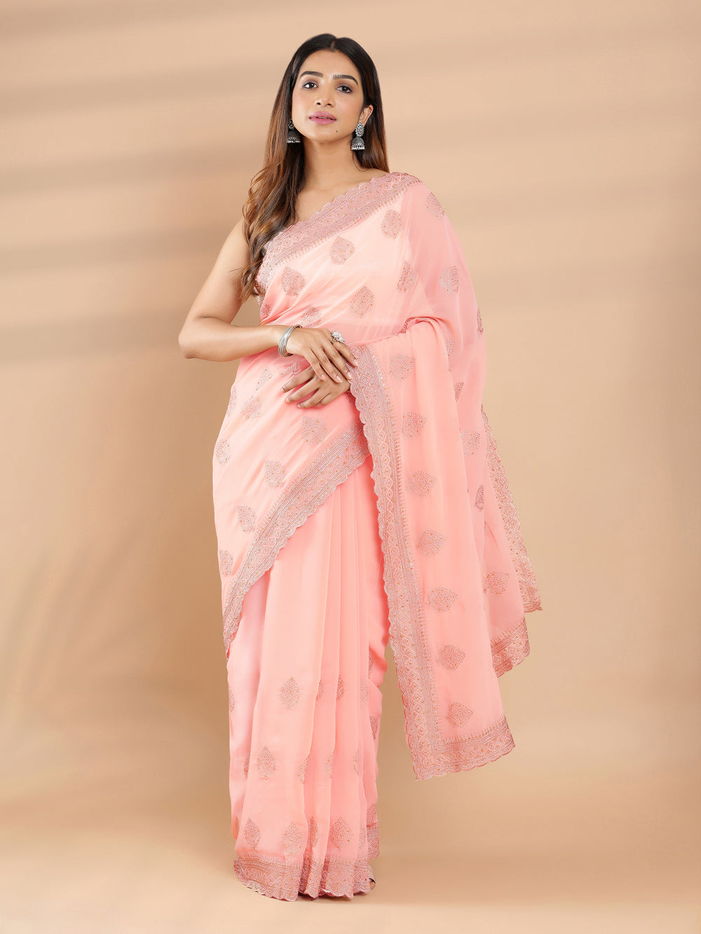 Peach Color Georgette Saree With Copper Leaf Embroidery On Body