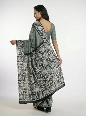 Cotton Sage Green Saree with Artistic Batik Design and Contrast Border