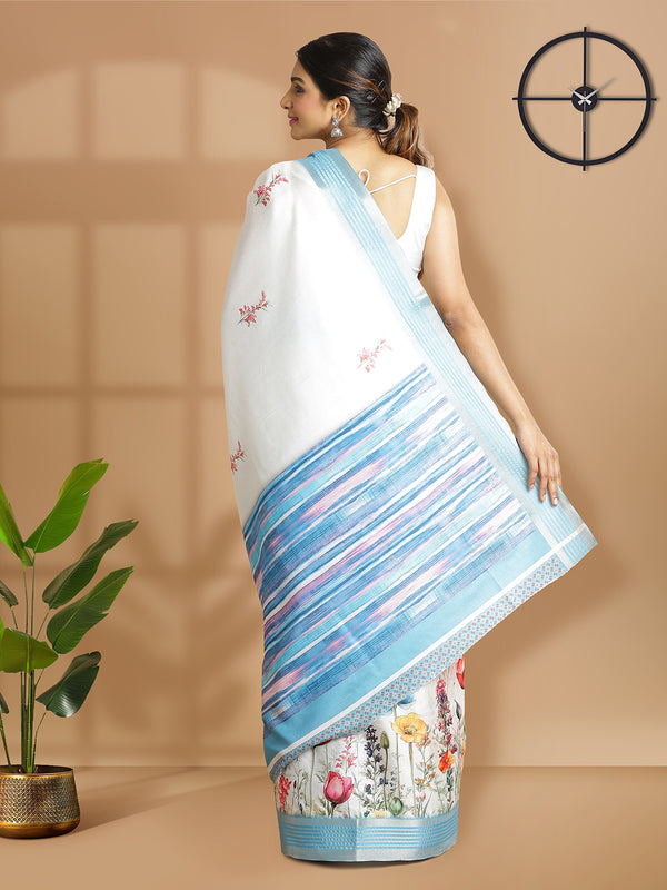 Off White Color Art Silk Saree With Blue Zari Border And Floral Design Over Body