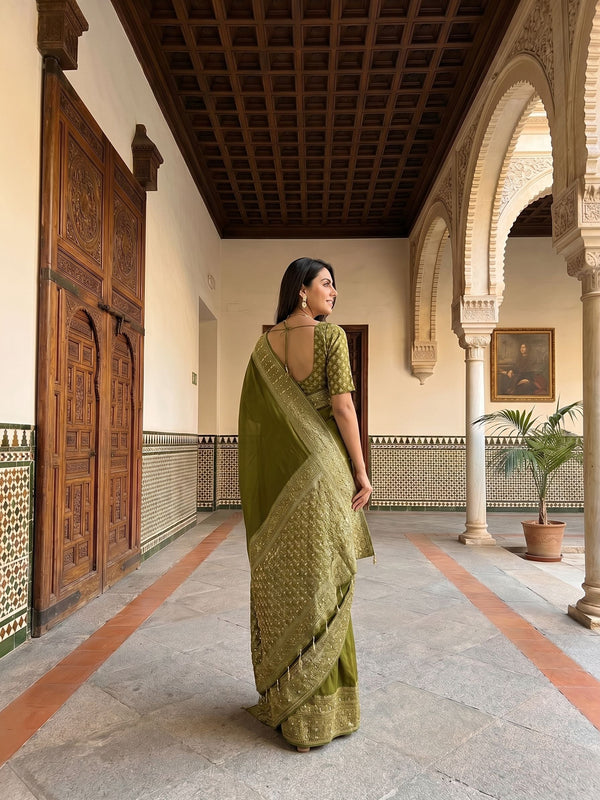 Kanjivaram Olive Green Plain Saree with Heavy Zari Embroidered Border and Rich Designer Pallu