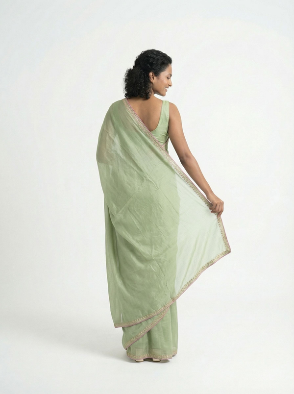 Organza Pastel Green Plain Saree with Minimal Embellished Border