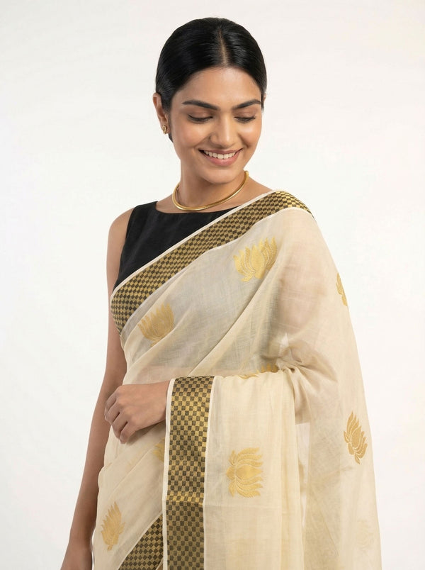 Tissue Cream with Golden Butta and Checked Border Pattern Onam Special Kerala Saree