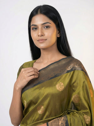 Semi Soft Silk Elegant Olive Green  Saree with Spread Butta Design