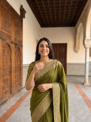 Kanjivaram Olive Green Plain Saree with Heavy Zari Embroidered Border and Rich Designer Pallu