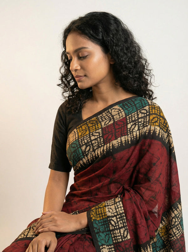 Cotton Maroon Printed Saree with Traditional Batik and Designer Border