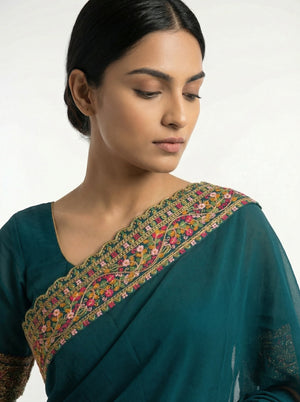 Georgette Peacock Blue Saree with Multicolor Embroidered Border