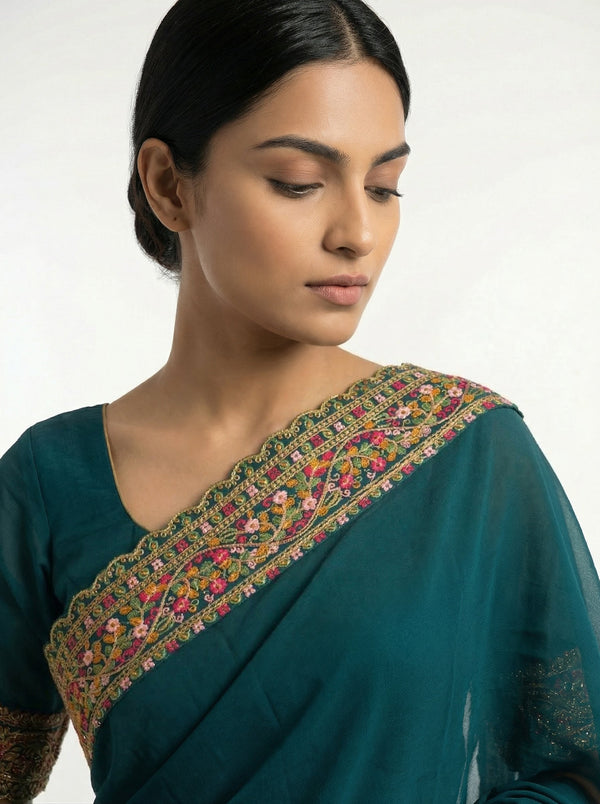 Georgette Peacock Blue Saree with Multicolor Embroidered Border