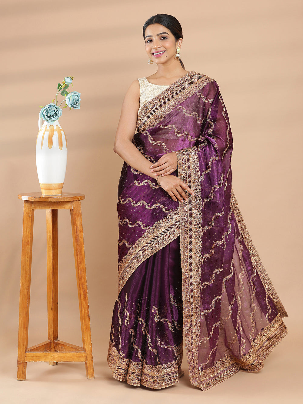 Purple Color Glass Organza Saree With Golden Embroidery Design On Body & Border