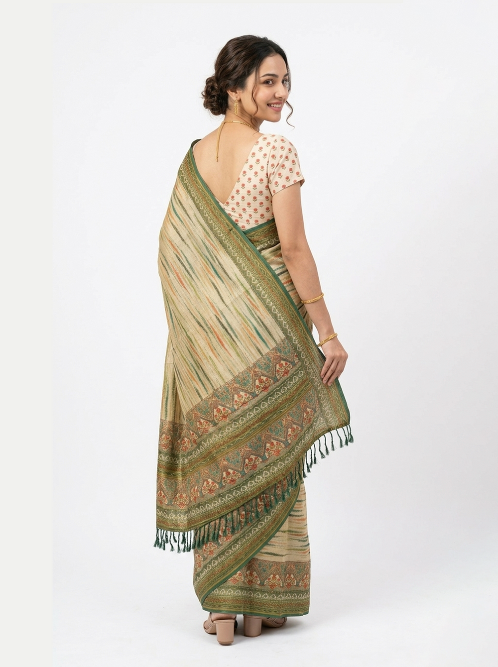 Woman wearing a traditional saree with a brown background