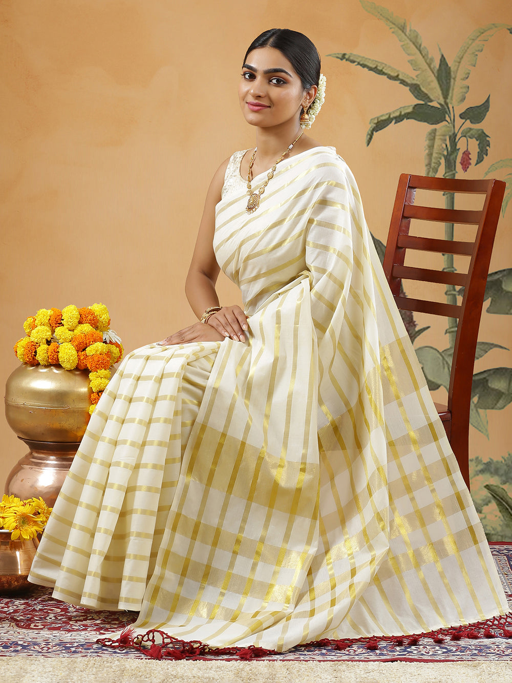 Off White Color Cotton Border Less Set Saree With Horizontal Golden Stripes With Red Tassels