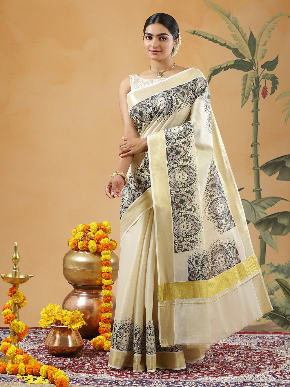 Golden Tissue Set Saree With Black Mural Print Of Devi Near Golden Kasavu Border