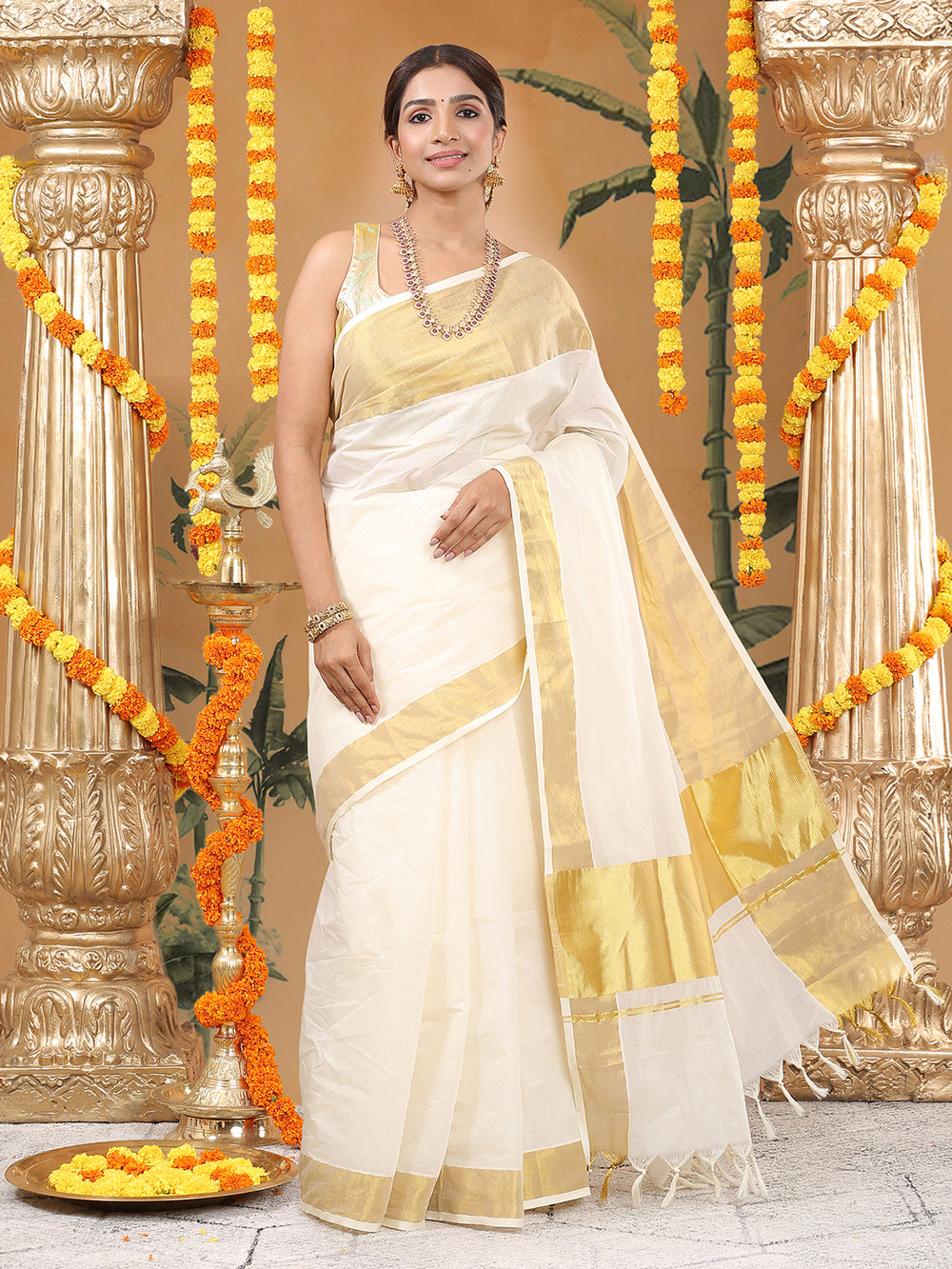 Off-White Cotton Set Saree with Dual Yellow Kasavu Border and Golden-Off White Tassels