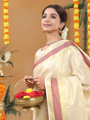 Golden Tissue Saree with Red Zari Borders & Red Tassels