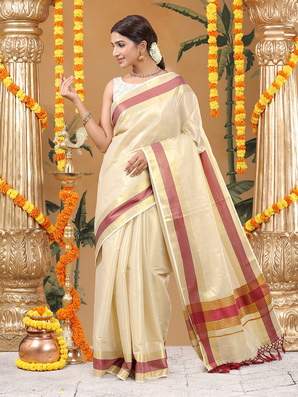 Golden Tissue Saree with Red Zari Borders & Red Tassels