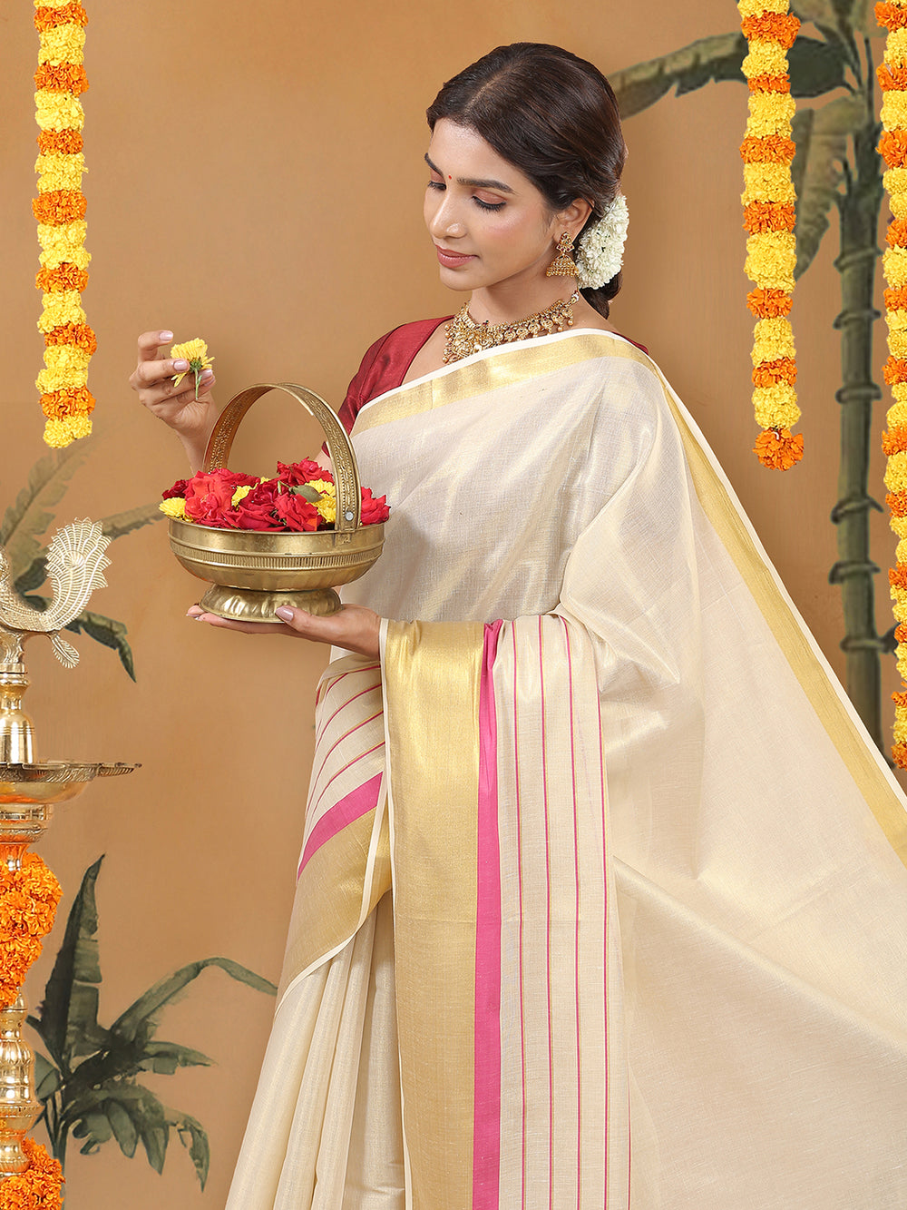 Golden Tissue Set Saree with Golden With Pink Dual Kasavu Layered Border And Pink & Cream Tassels