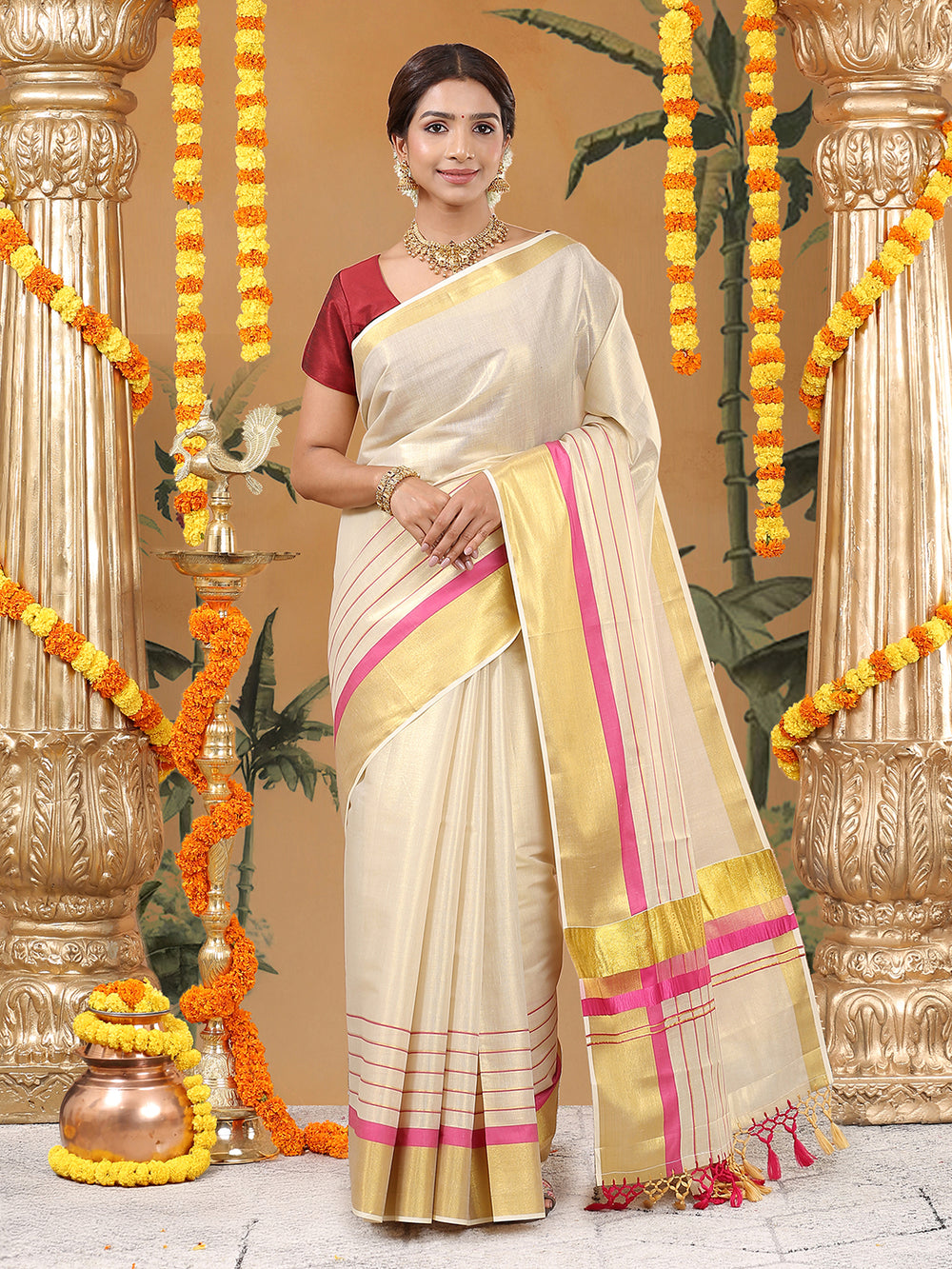 Golden Tissue Set Saree with Golden With Pink Dual Kasavu Layered Border And Pink & Cream Tassels