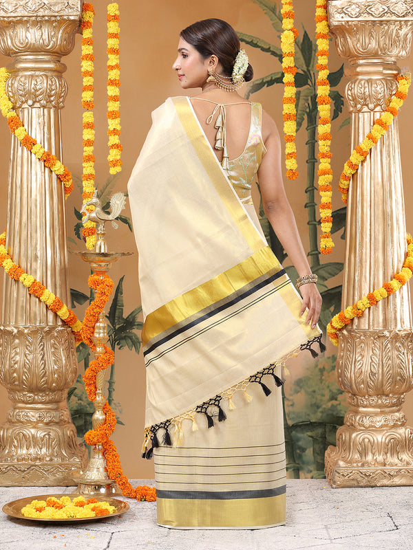 Golden Tissue Saree with Black Kasavu Border & Black-Cream Tassels