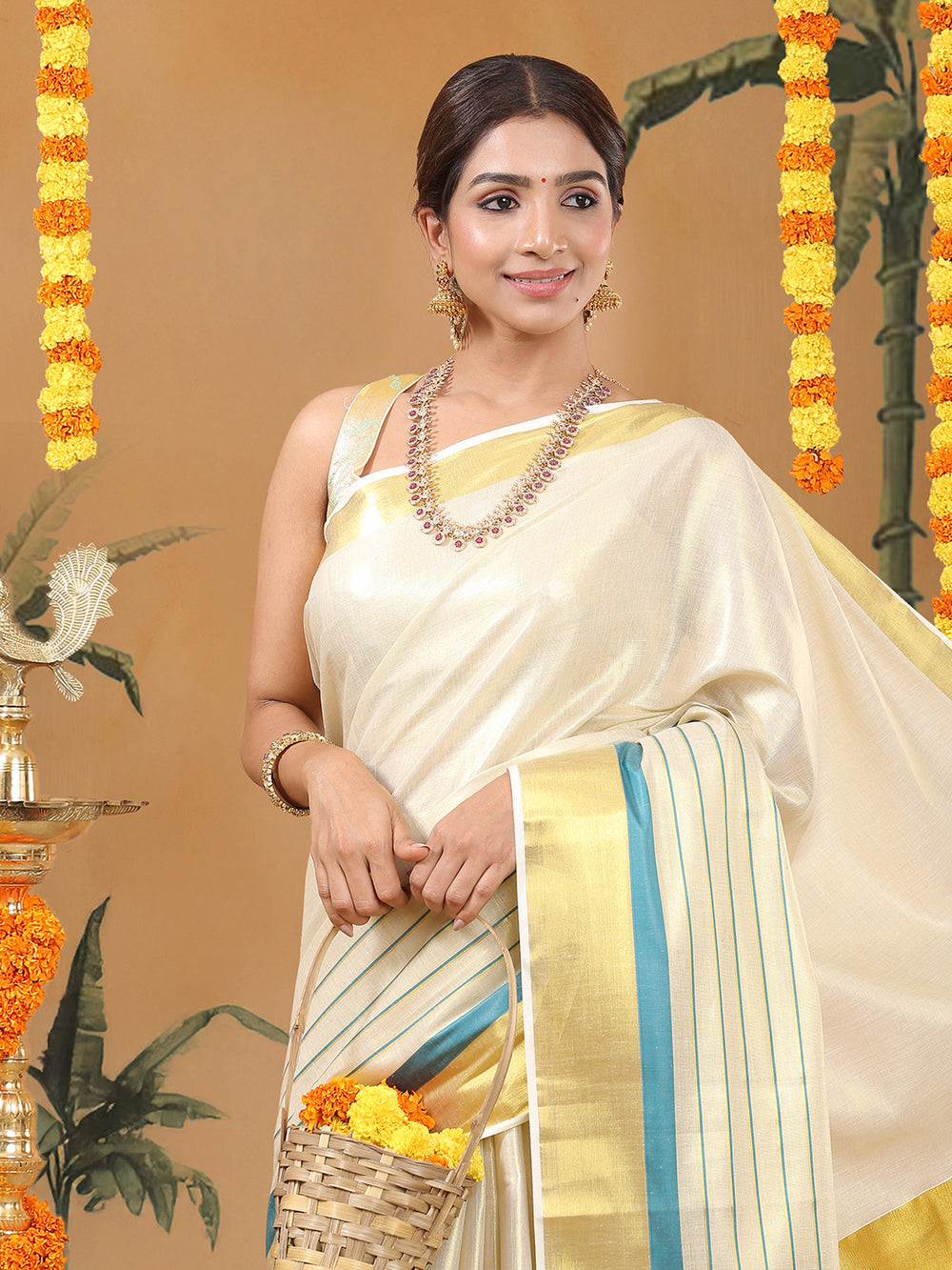 Golden Tissue Set Saree with Golden With Teal Dual Kasavu Layered Border And Teal & Cream Tassels