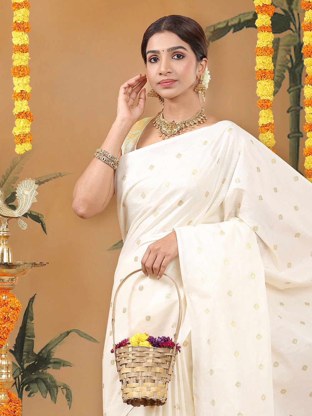 Off-White Borderless Cotton Saree with Golden Buttas & Olive Green Tassels