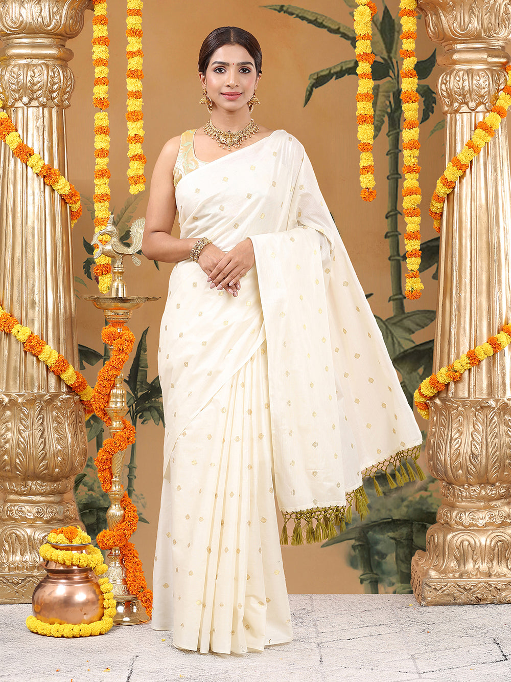 Off-White Borderless Cotton Saree with Golden Buttas & Olive Green Tassels