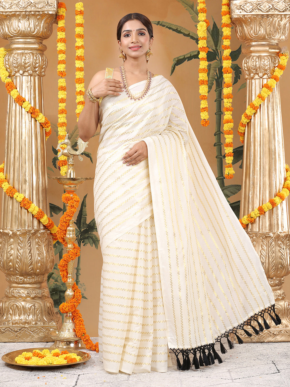 Off-White Cotton Borderless Set Saree with Golden Zigzag Stripes and Black Tassels