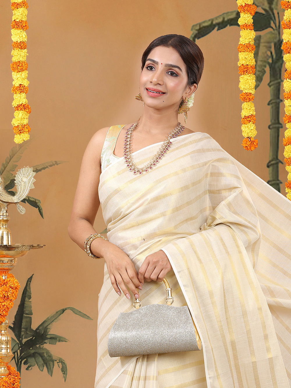 Minimalist Golden Tissue Borderless Set Saree with All-Over Golden Stripes & Black Tassels