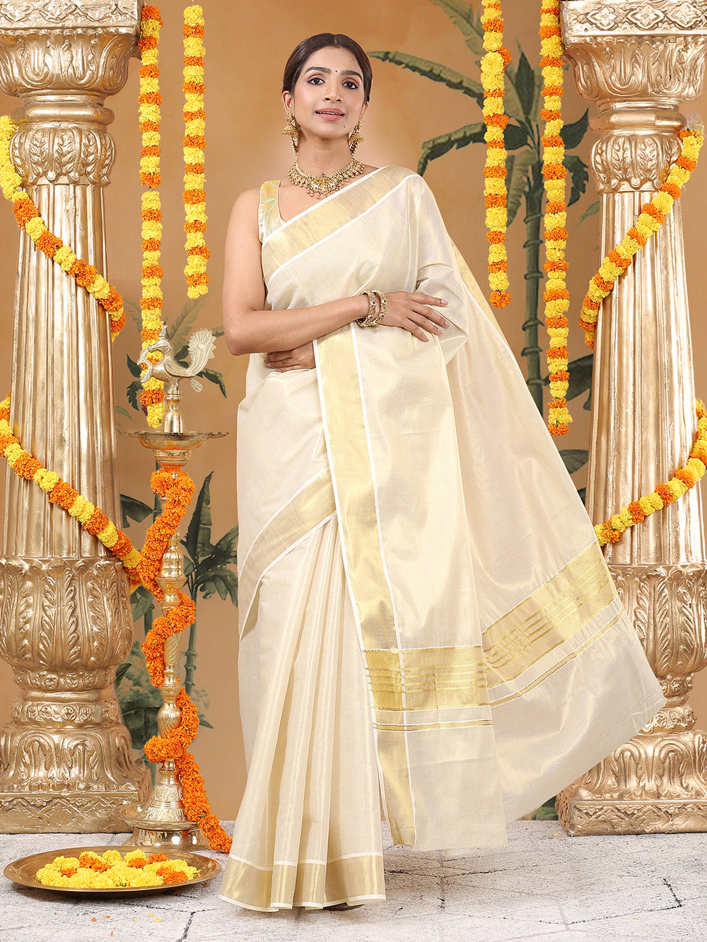Golden Tissue Plain Set Saree with Classic Golden Stripes on a Kasavu-Bordered Pallu.