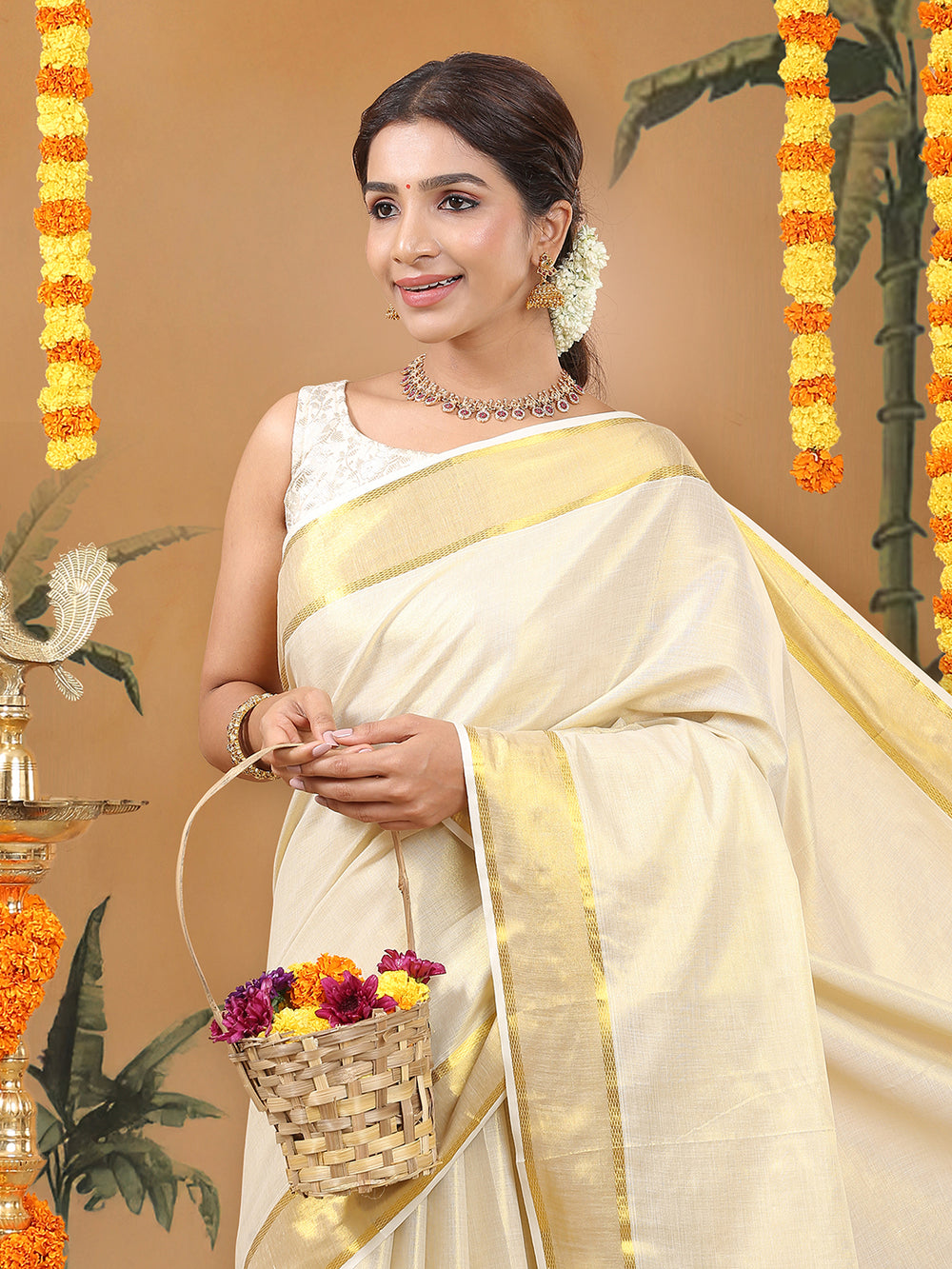Golden Tissue Saree with Peacock Design on Pallu & Golden Zari Border