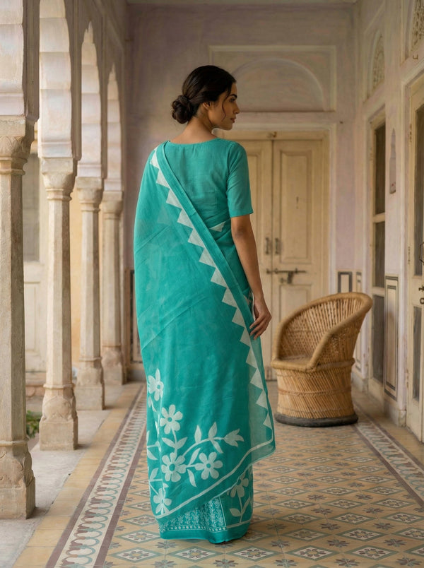 Teal Blue Soft Cotton Saree with White Floral Print & Contrast Border