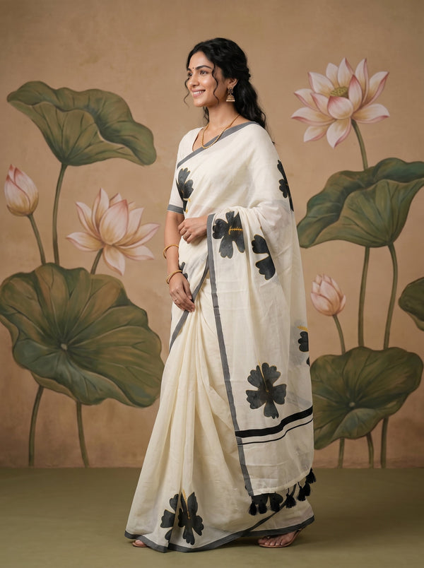 Cotton Cream Black Hibiscus Print Tassel Border Onam Special Kerala Saree