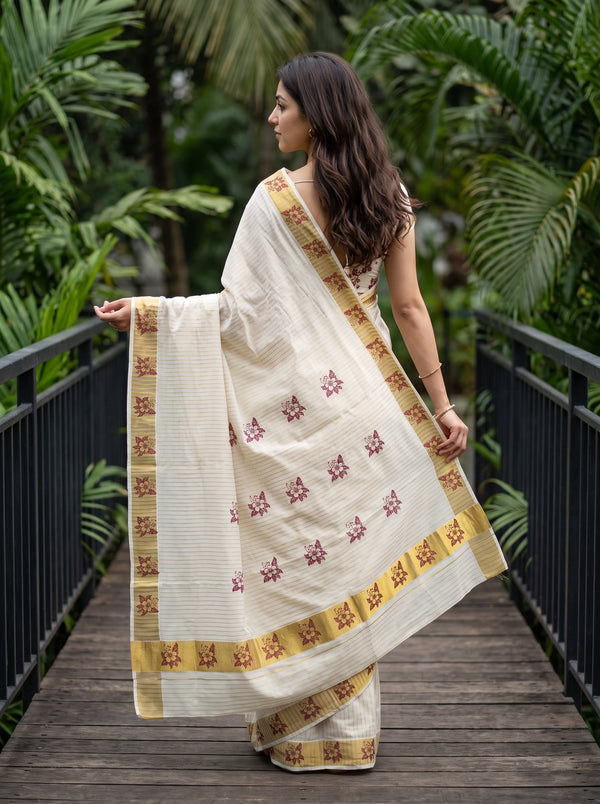 Cotton Cream Maroon Hibiscus Print Kerala Saree with Golden Zari Border