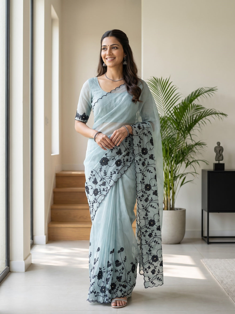 Net Kota Saree in Powder Blue with Black Floral Embroidery